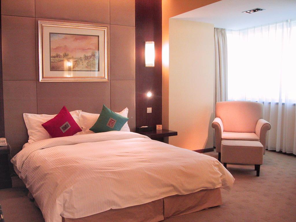 Maxcourt Hotel Changchun Zimmer foto